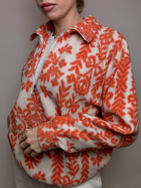 Cream and orange graphic fleece with zipped neck M vintage