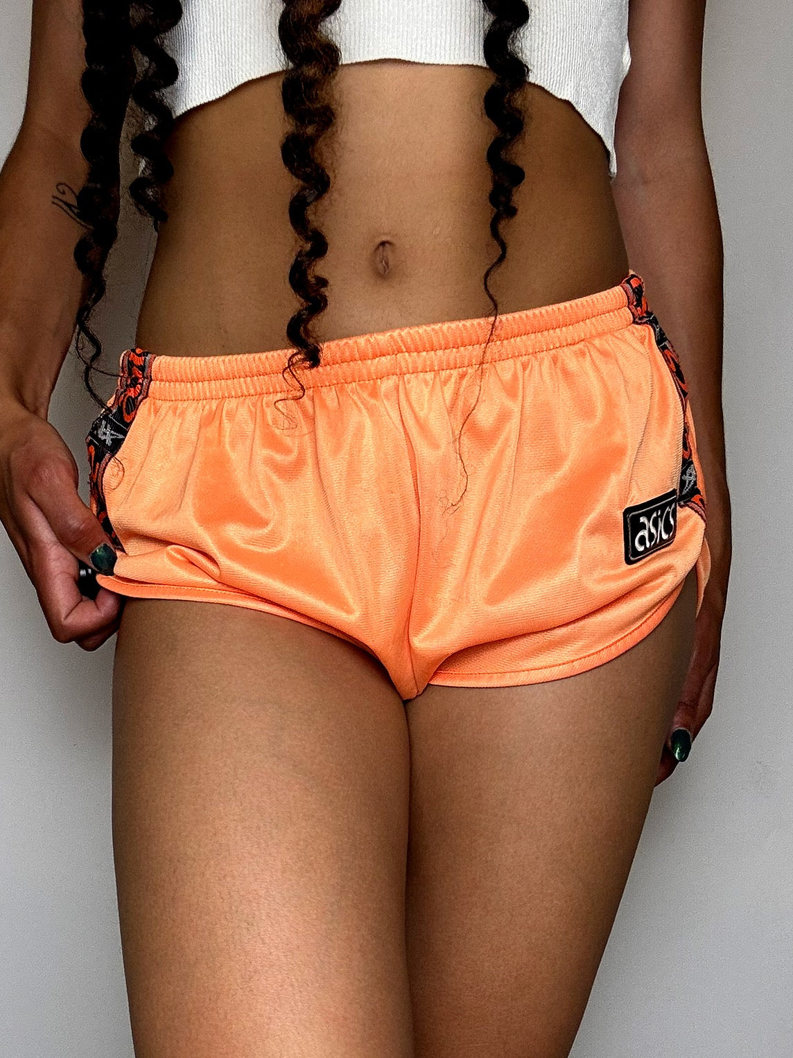 Mini Short de sport orange ASICS S vintage
