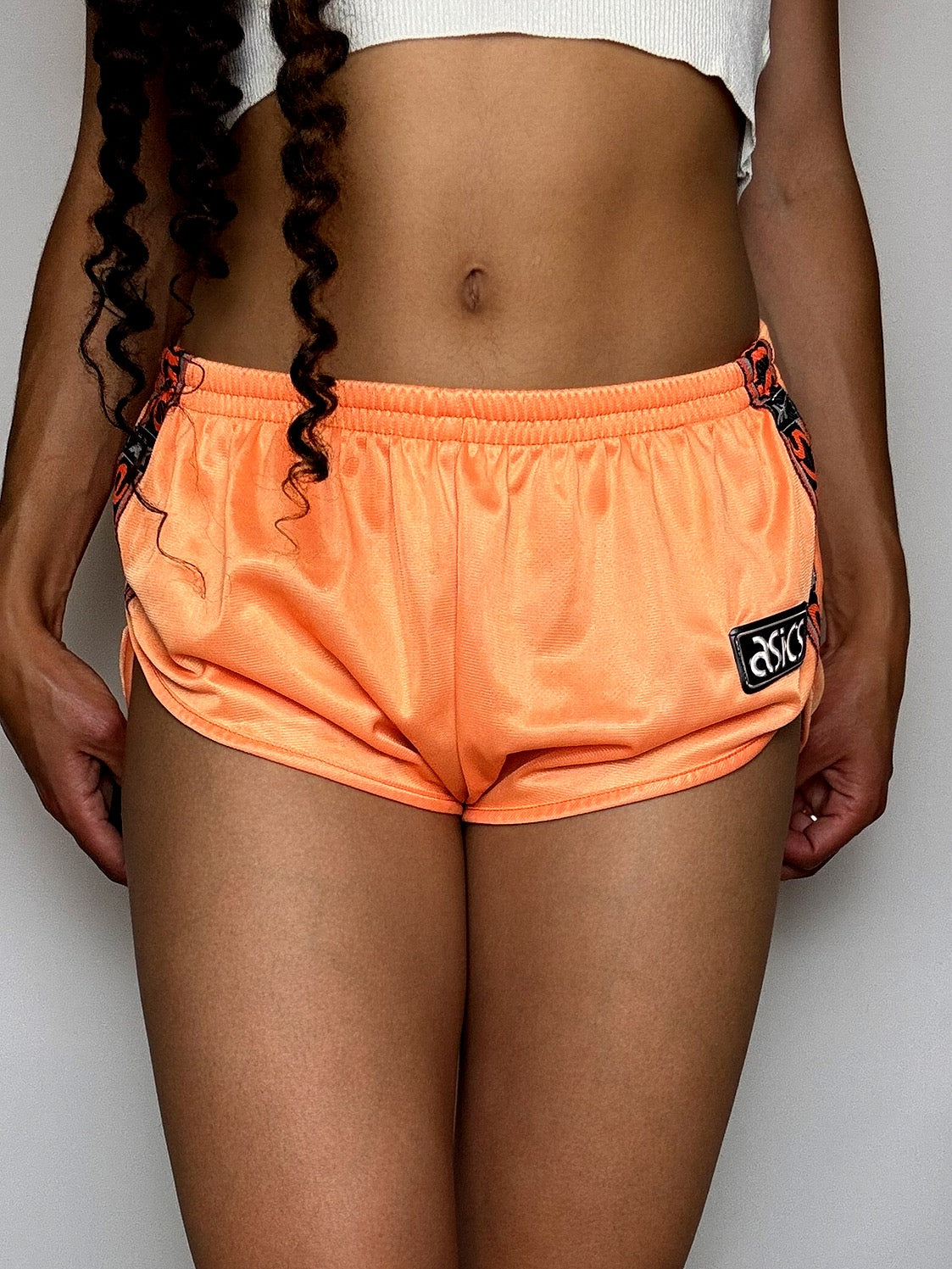 Mini Short de sport orange ASICS S vintage