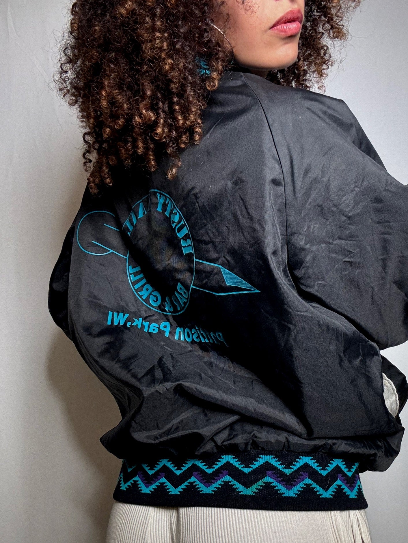 Vintage black graphic M bomber
