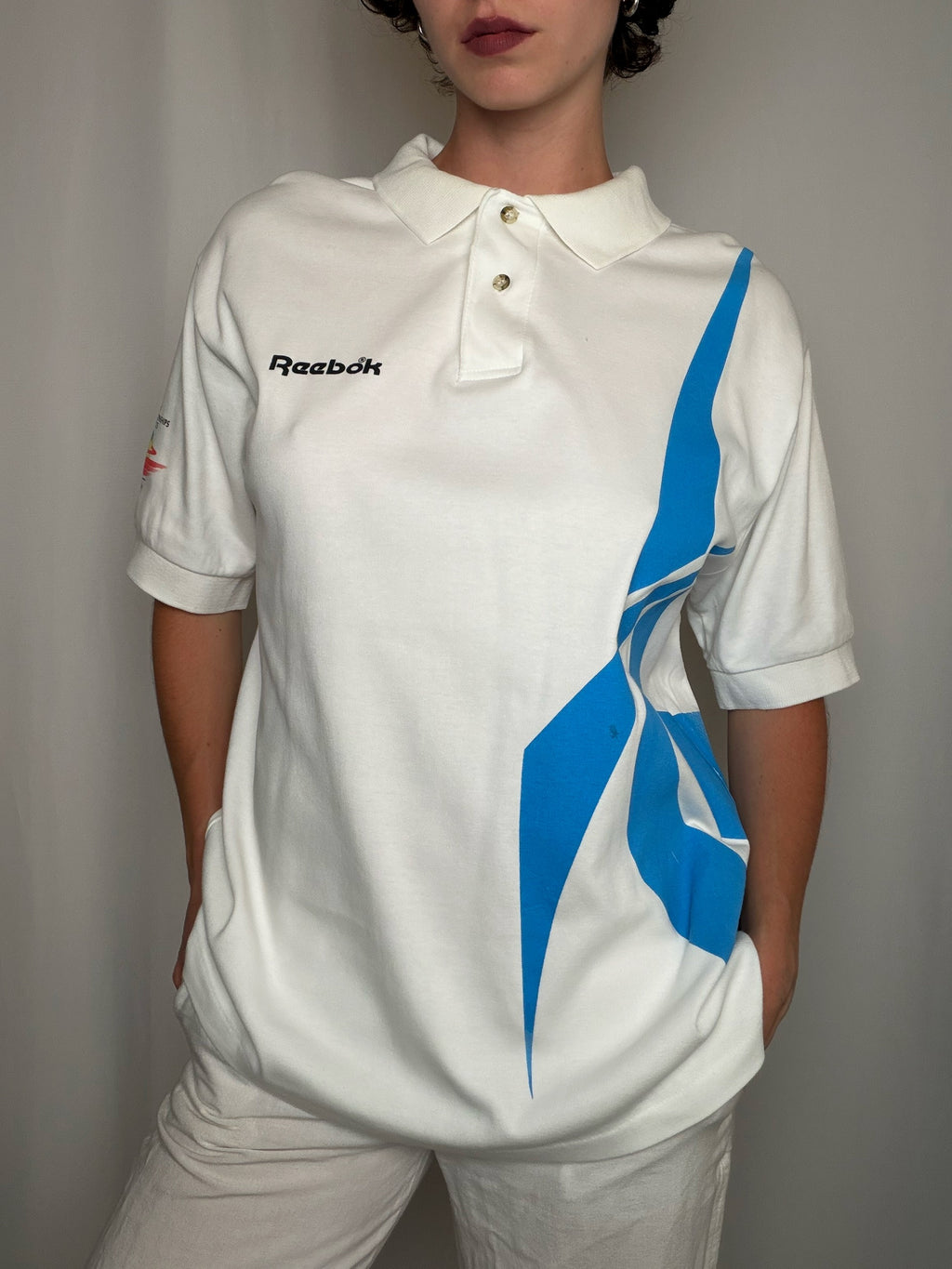 Polo blanc et bleu Reebok L vintage