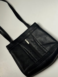 Black leather bag with zip