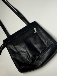 Black leather bag with zip