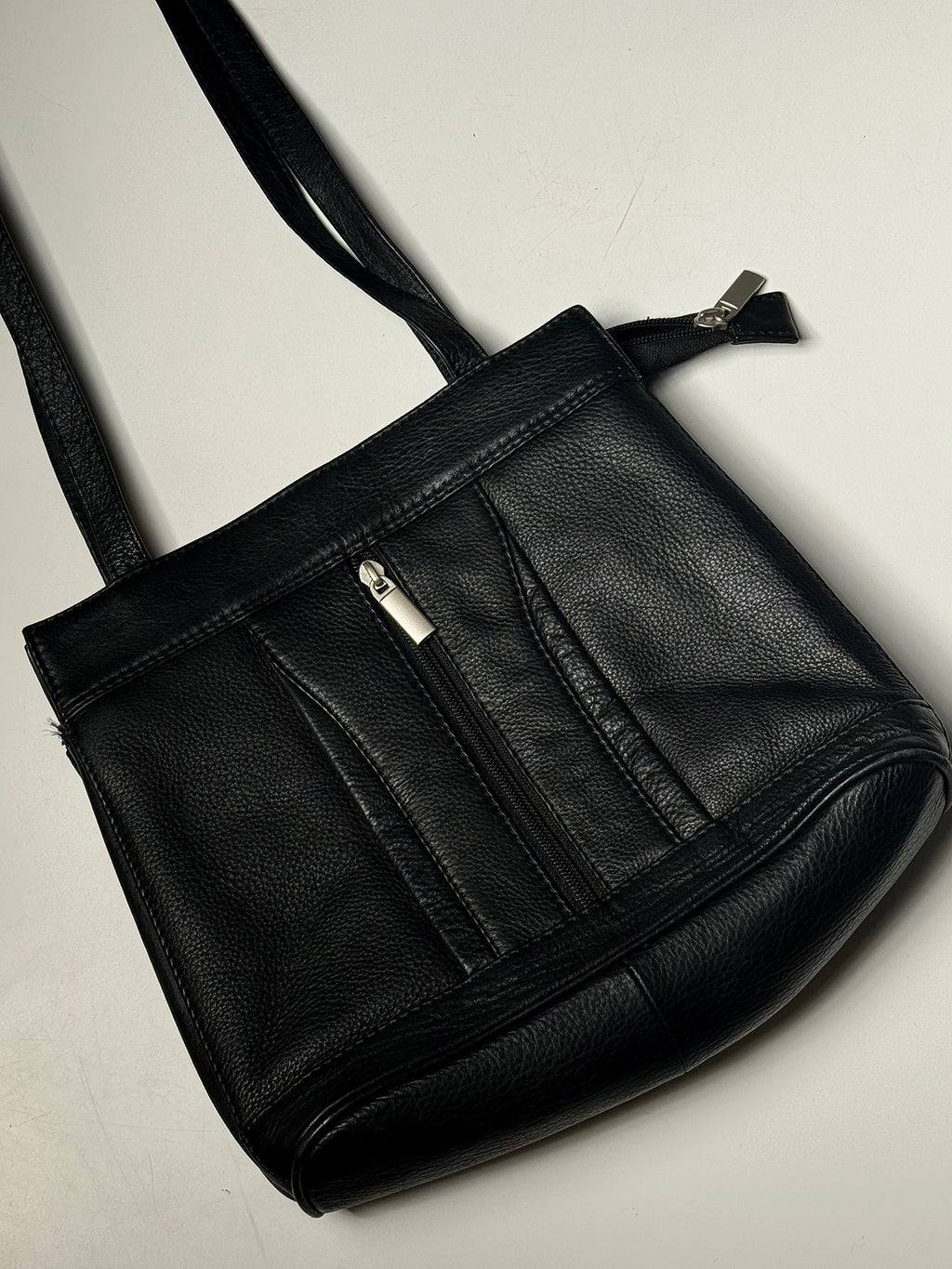 Black leather bag with zip
