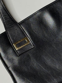 Sac a main en cuir noir vintage