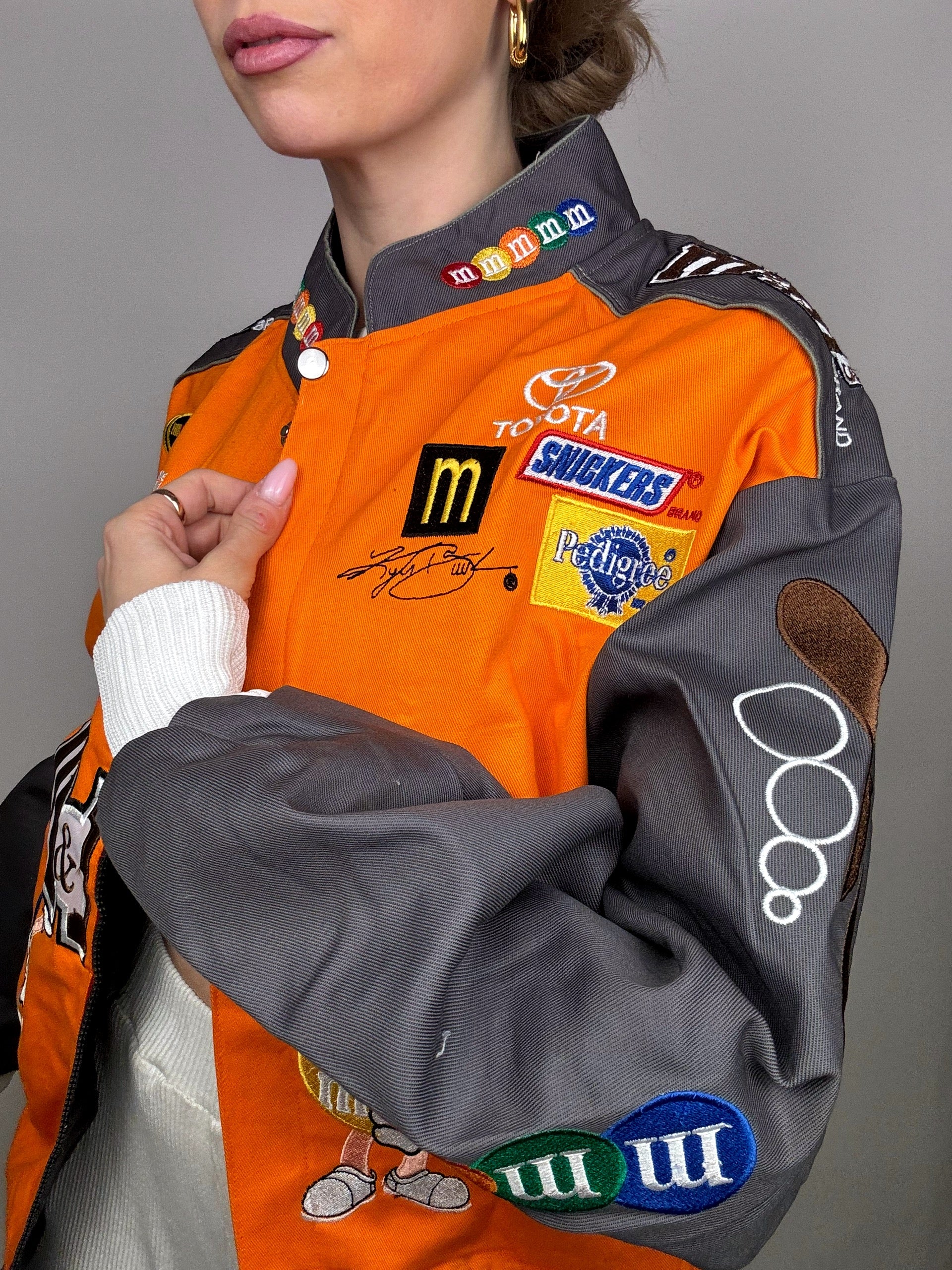 JH DESIGN x NASCAR M&amp;M's L orangefarbene Kollektionsjacke