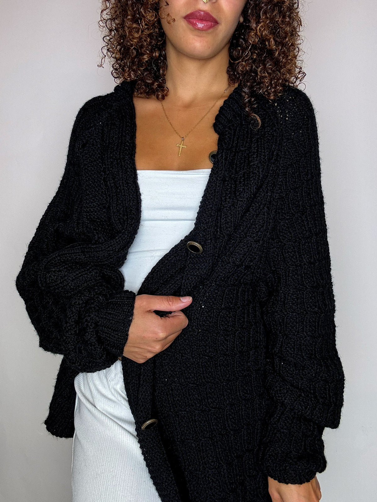 Black knit cardigan with oversized vintage jeweled buttons