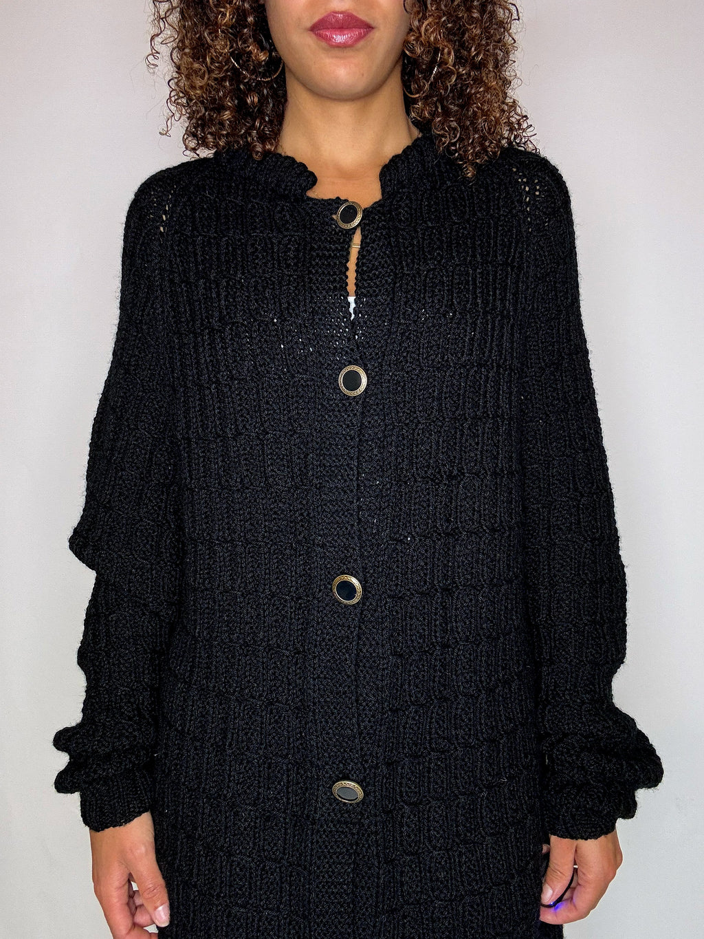 Black knit cardigan with oversized vintage jeweled buttons