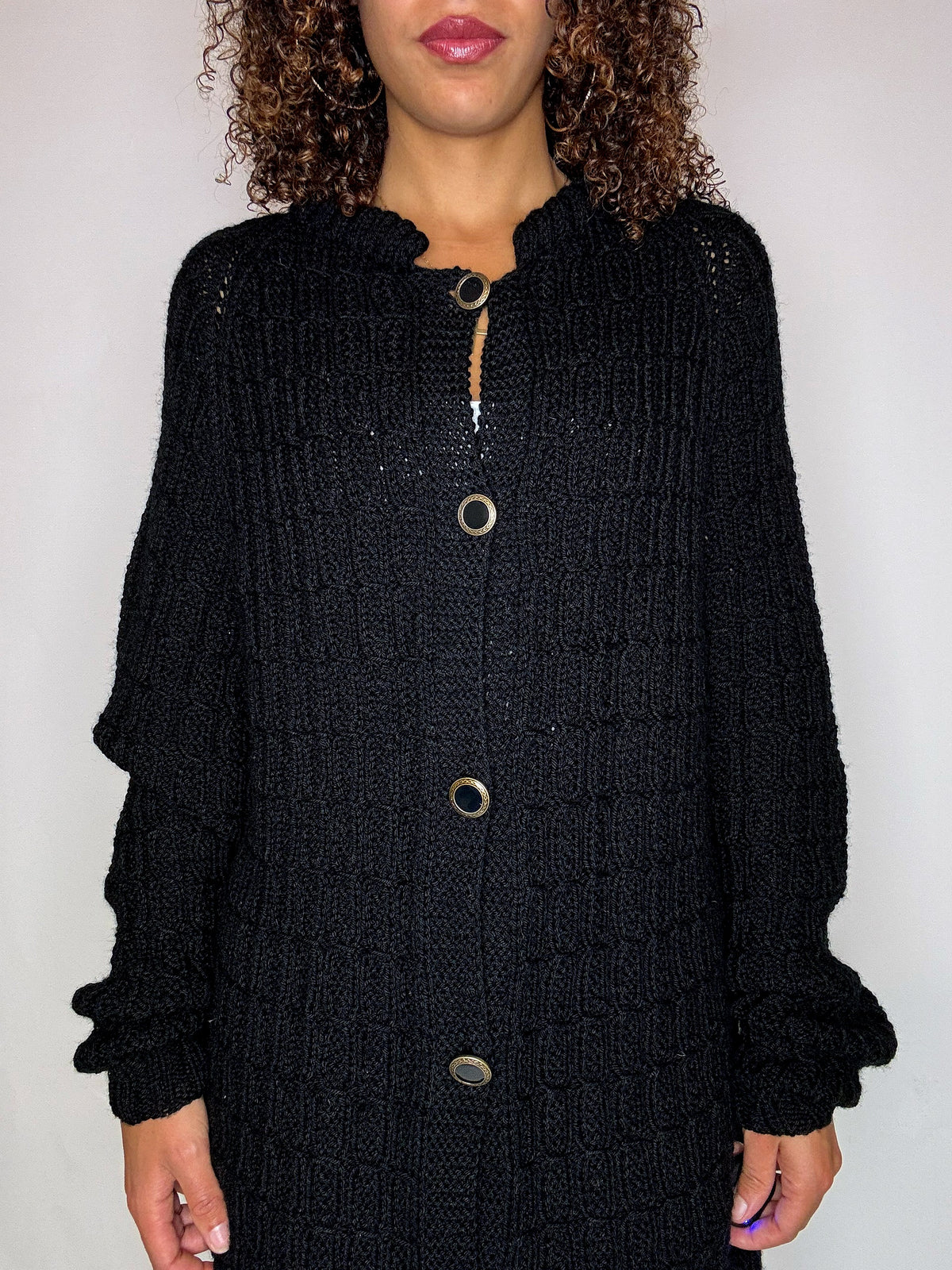 Black knit cardigan with oversized vintage jeweled buttons
