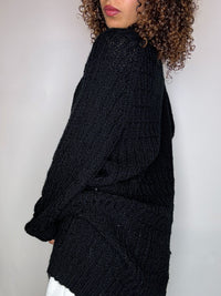 Black knit cardigan with oversized vintage jeweled buttons