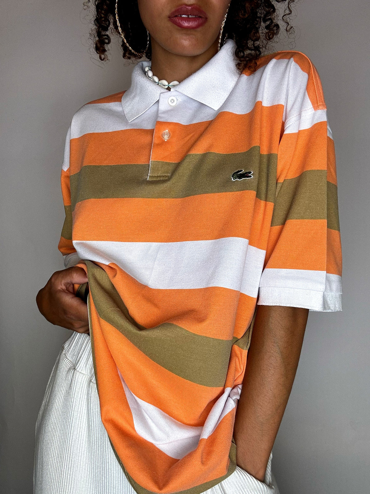 Vintage Lacoste Poloshirt mit orangefarbenen Streifen, Größe XL
