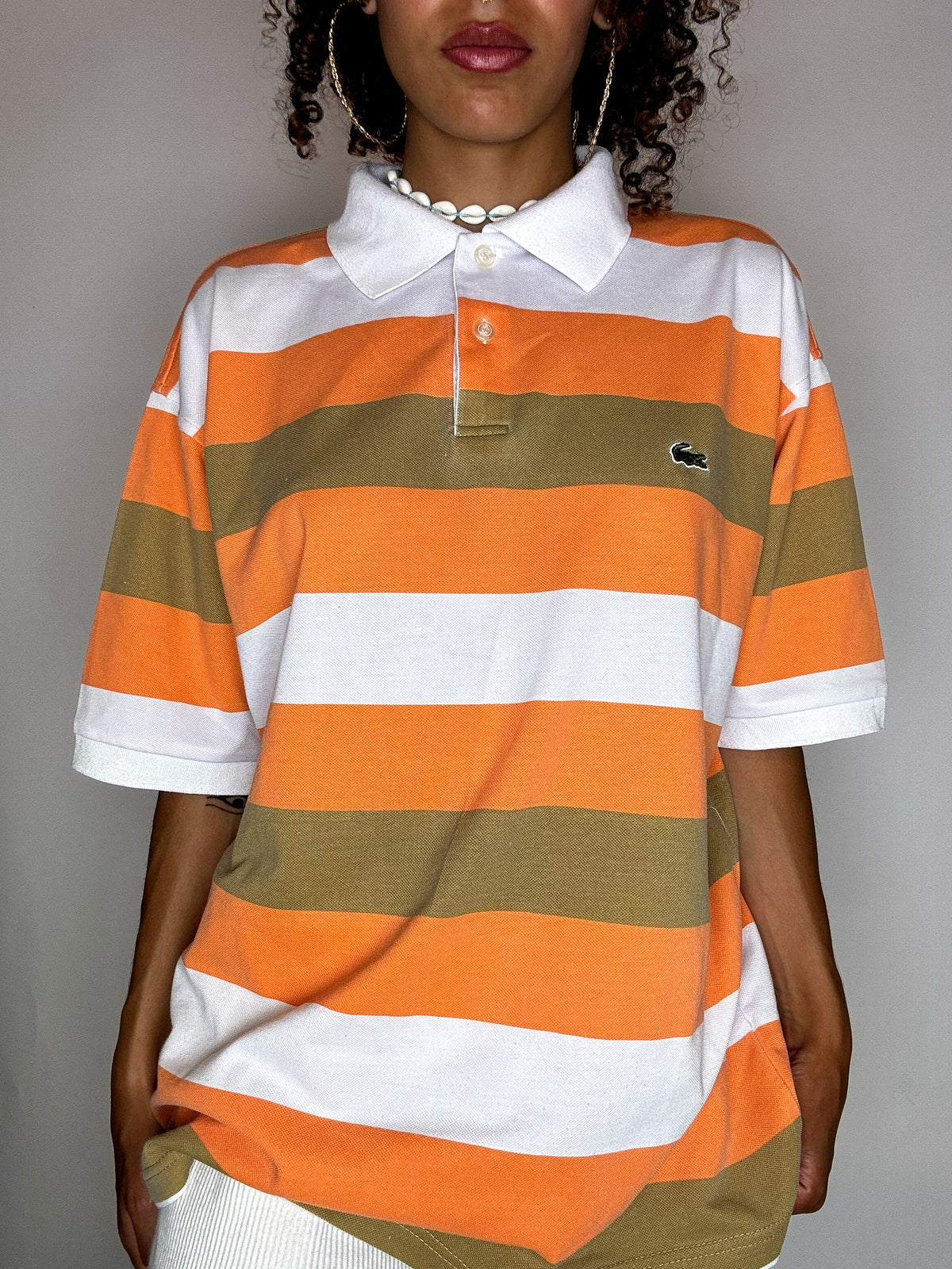 Vintage Lacoste Poloshirt mit orangefarbenen Streifen, Größe XL