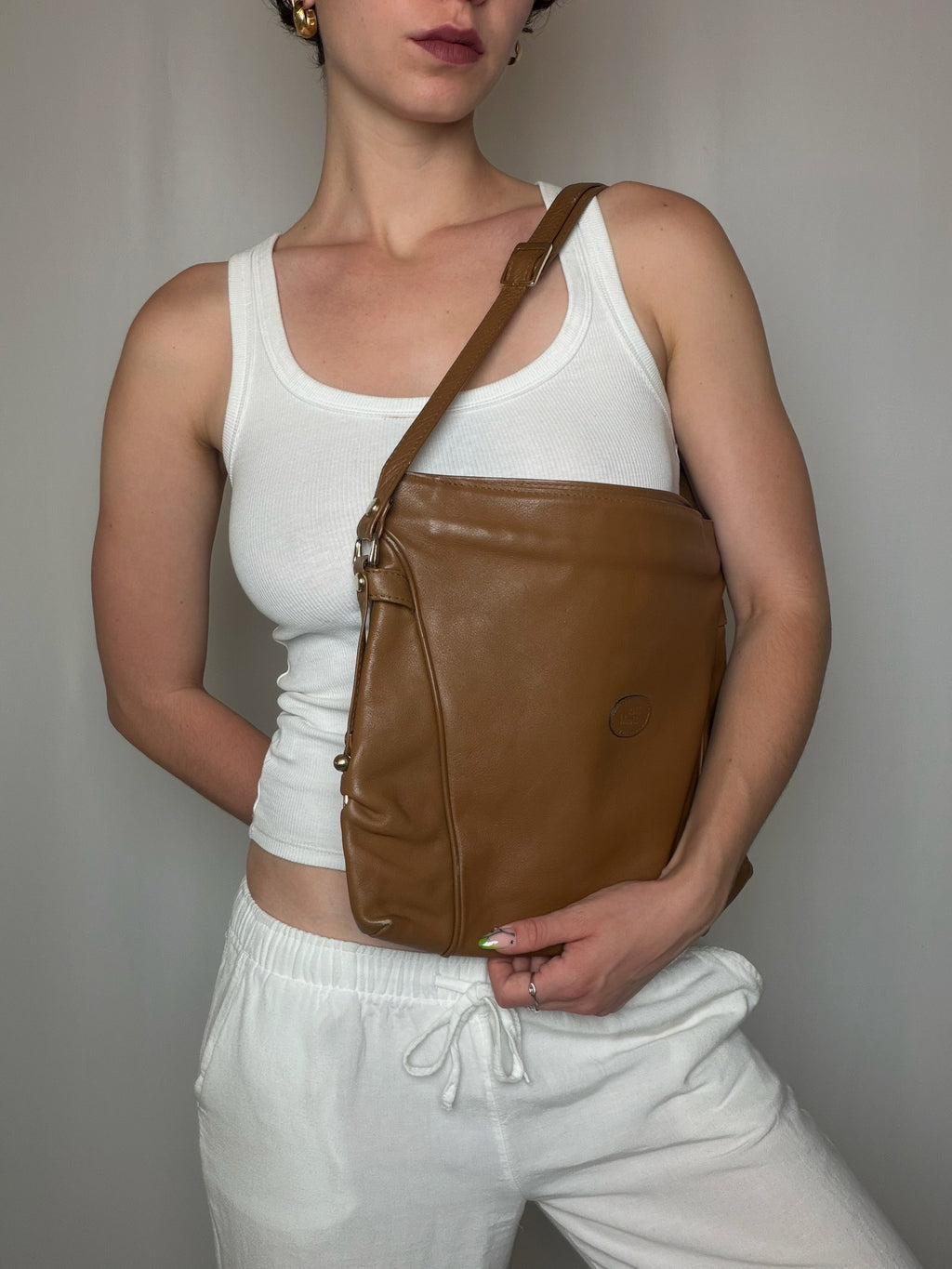 Vintage schwarze Ledertasche mit Schulterriemen