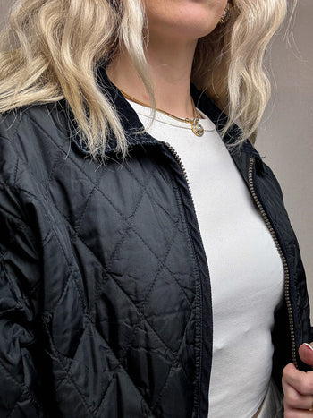 Veste matelassée noire S/M vintage