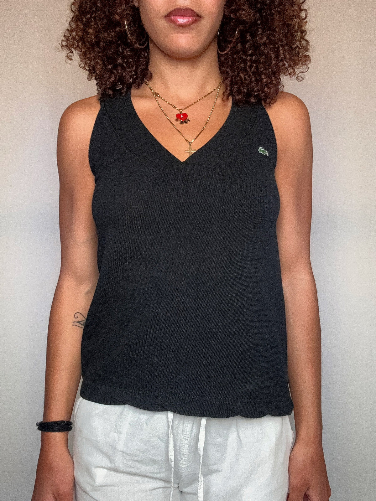 Débardeur matière polo noir Lacoste S vintage