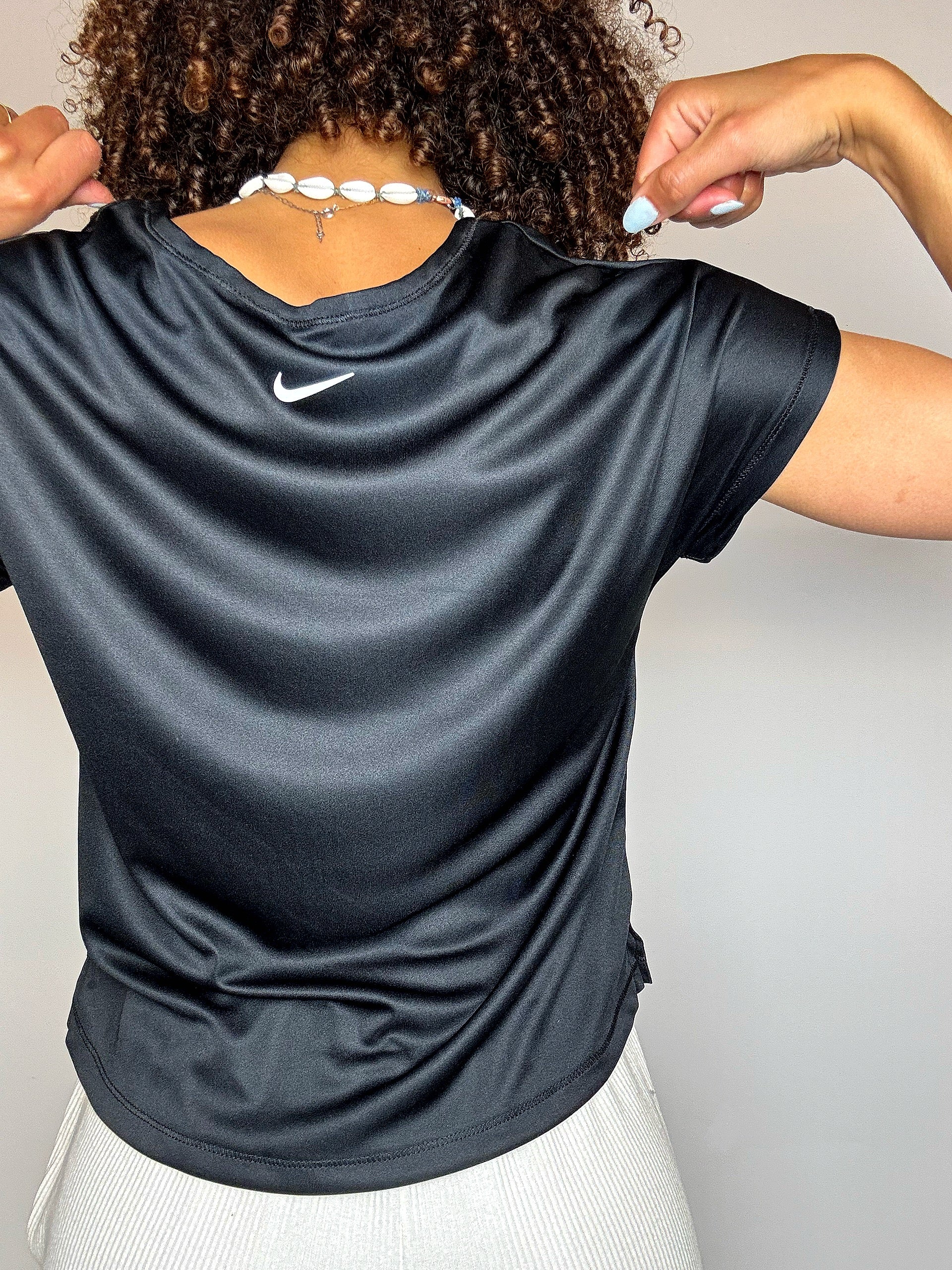 Top de sport noir NIKE XS vintage