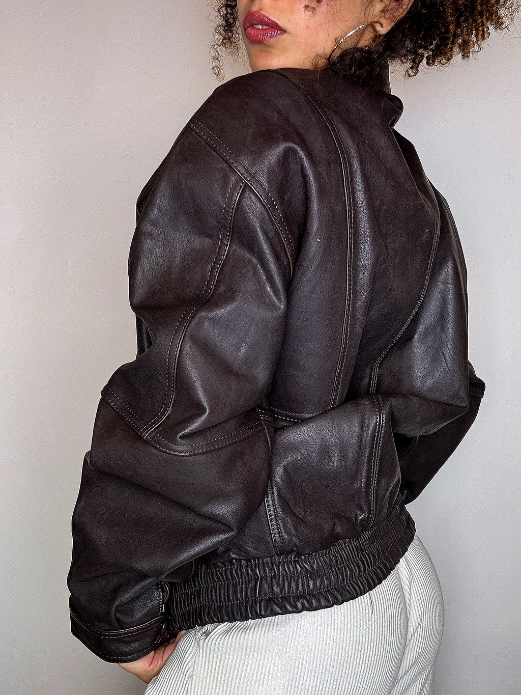 Vintage-Lederjacke in Schwarz und Braun, Größe M/L