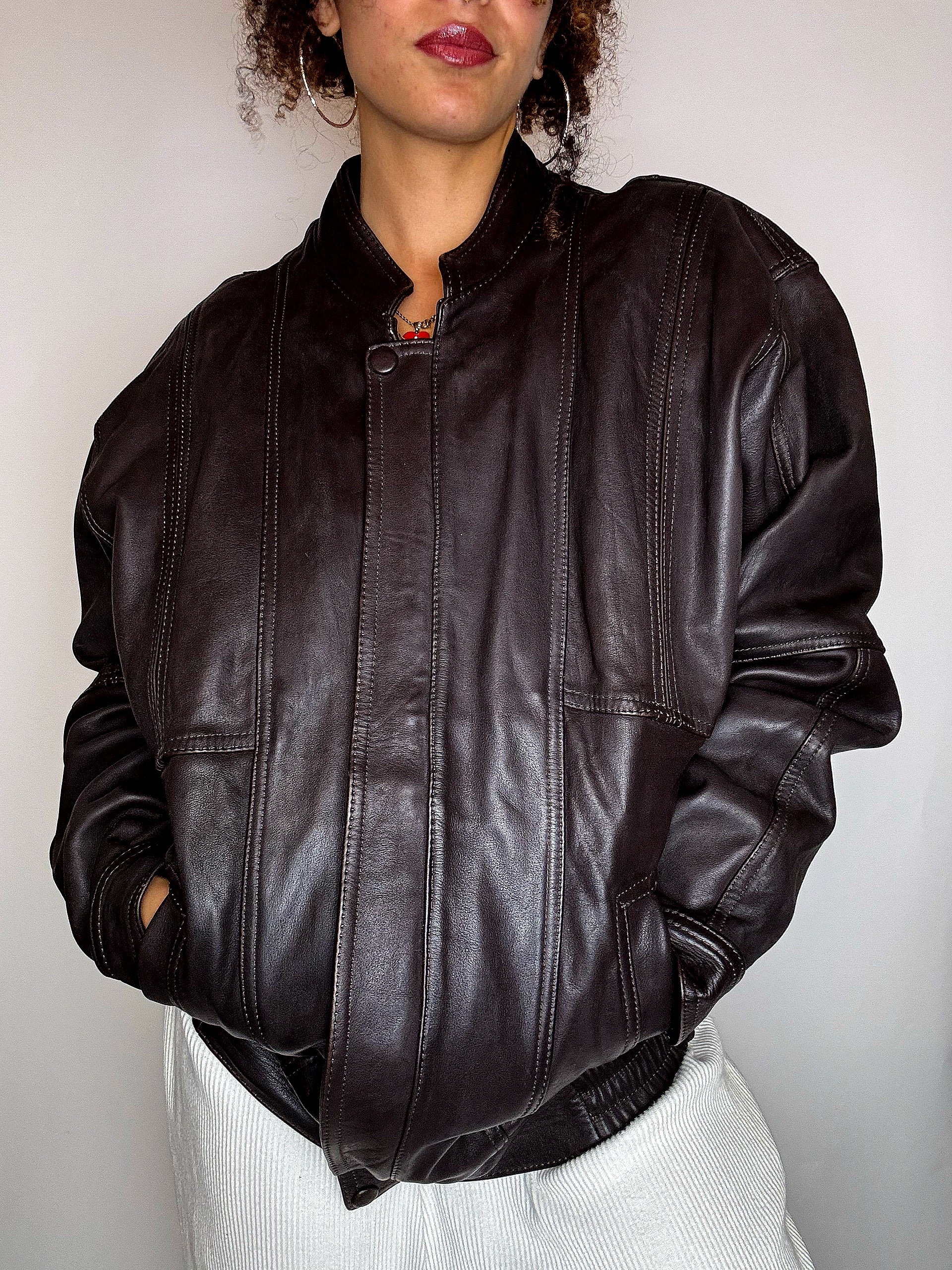 Vintage-Lederjacke in Schwarz und Braun, Größe M/L