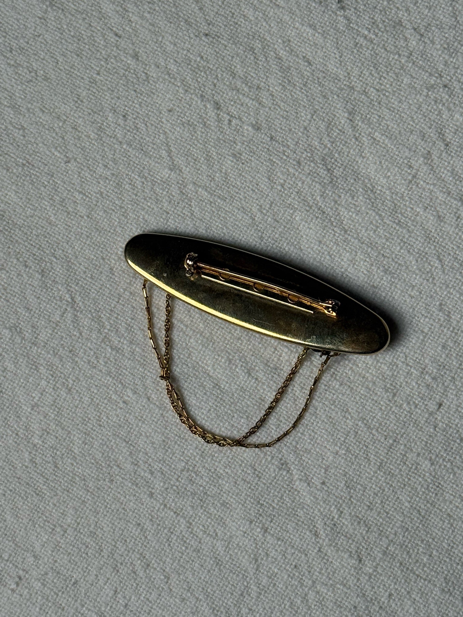 Vintage Brosche mit Steinen und Ketten