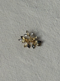 Vintage gold-plated brooch with silver details