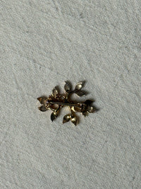 Vintage gold-plated brooch with silver details