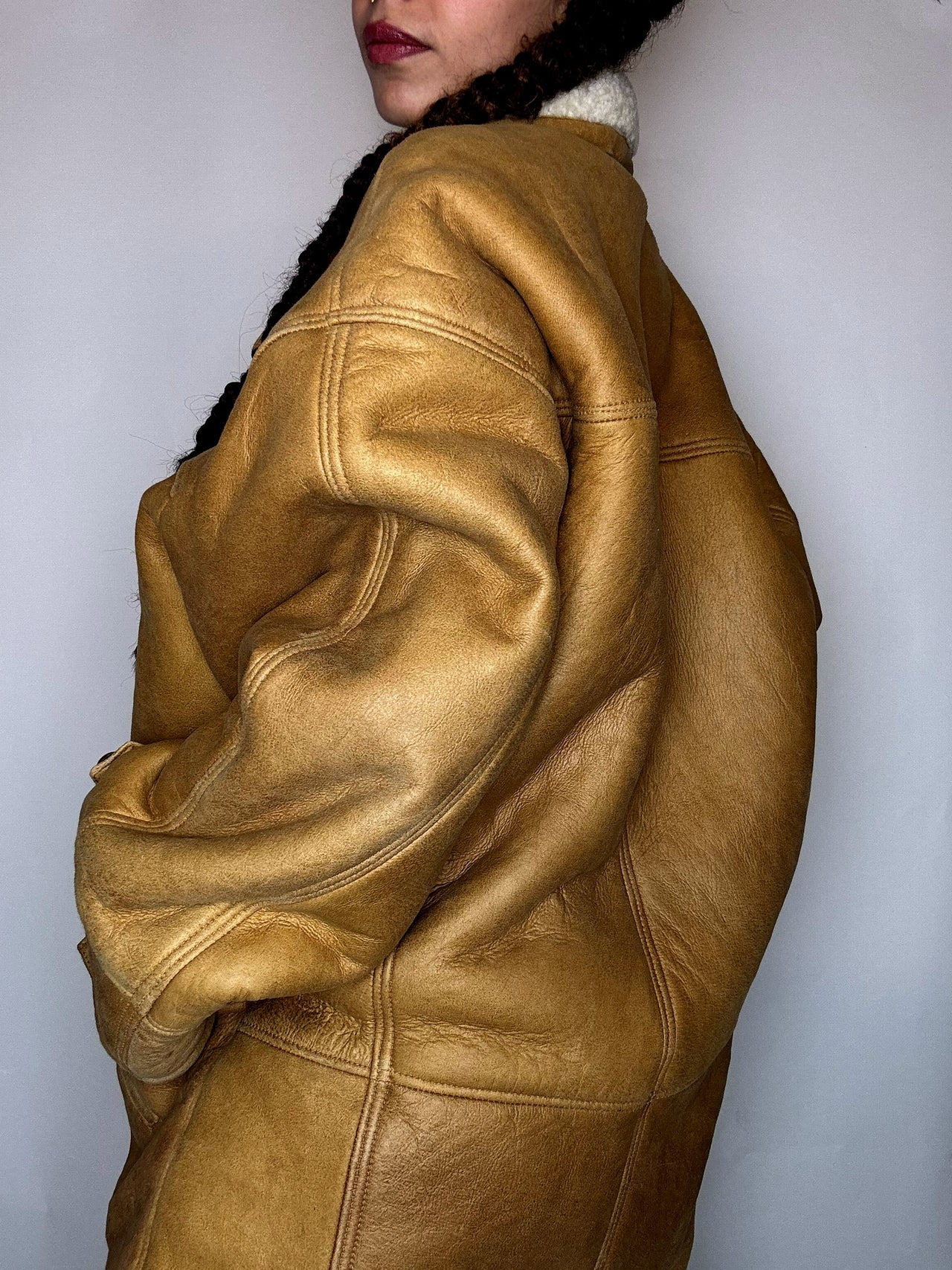 Manteau en peau de mouton retournée beige XL vintage