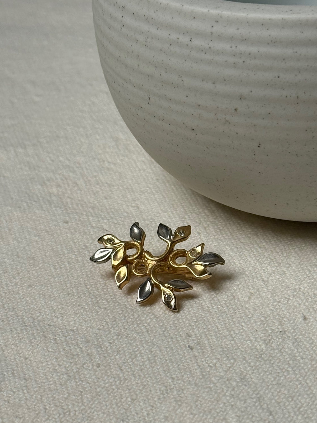 Vintage gold-plated brooch with silver details