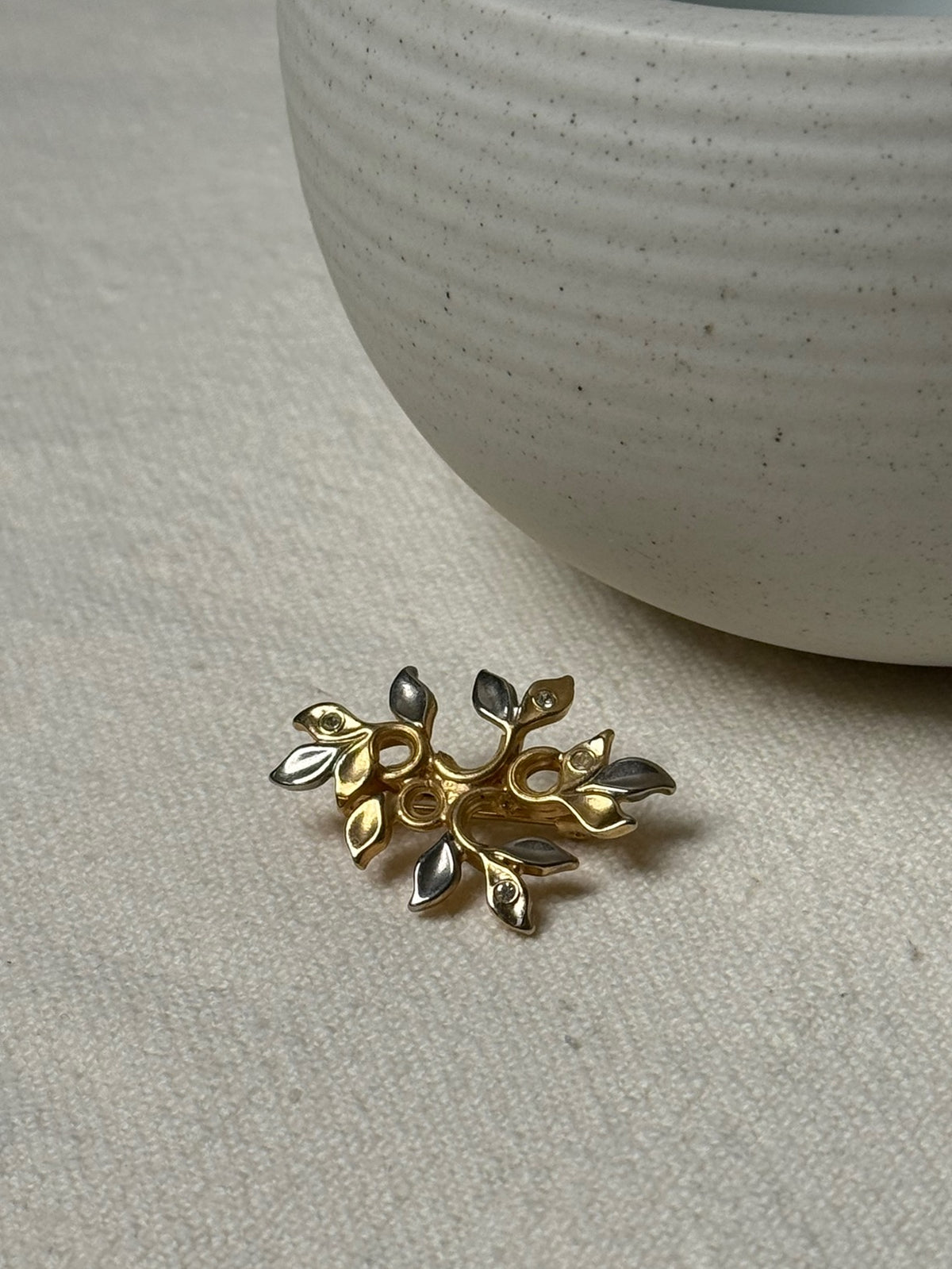 Vintage gold-plated brooch with silver details