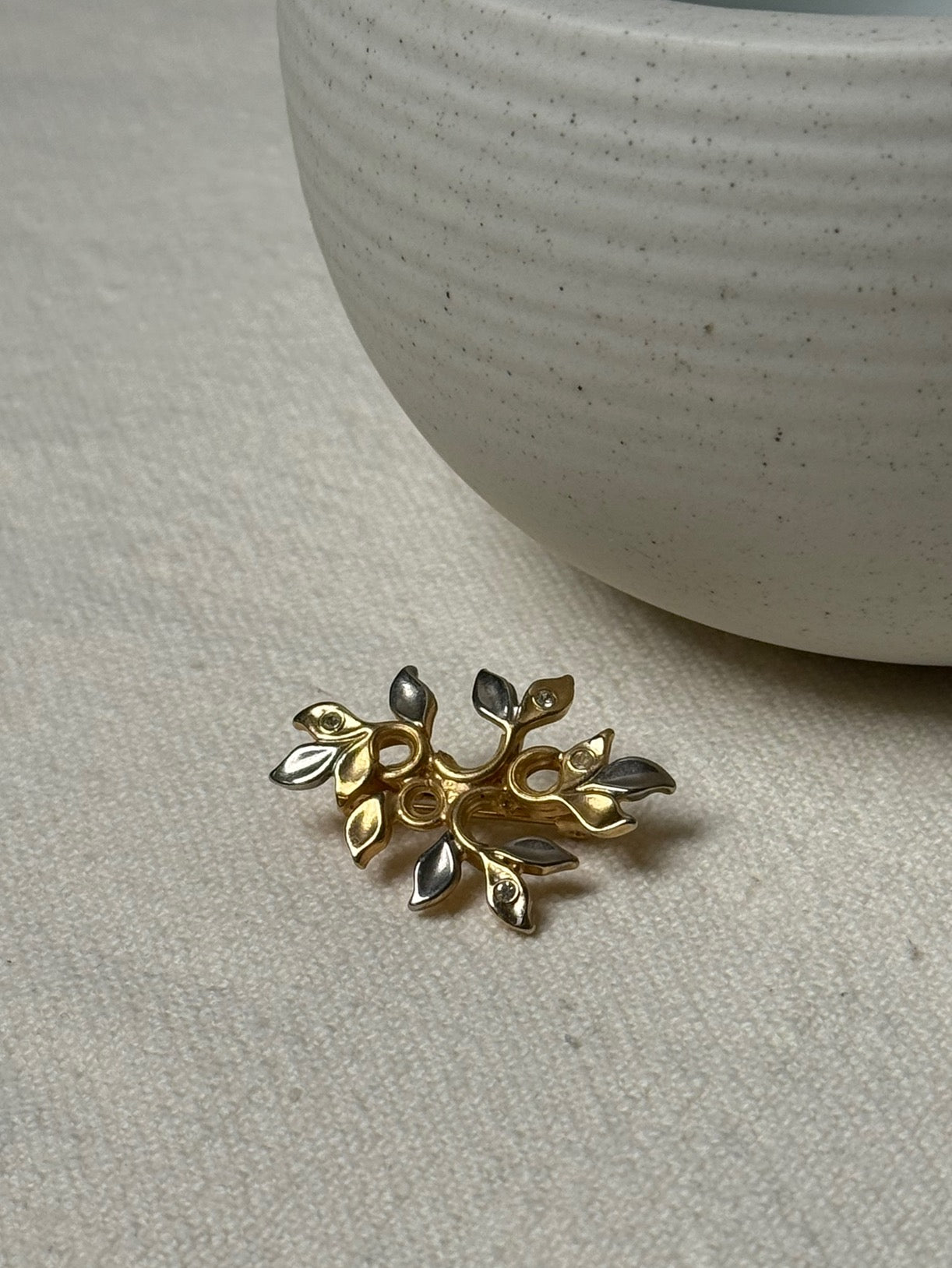 Vintage gold-plated brooch with silver details