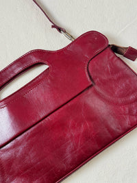 Sac moyen en cuir bordeaux avec poignées vintage