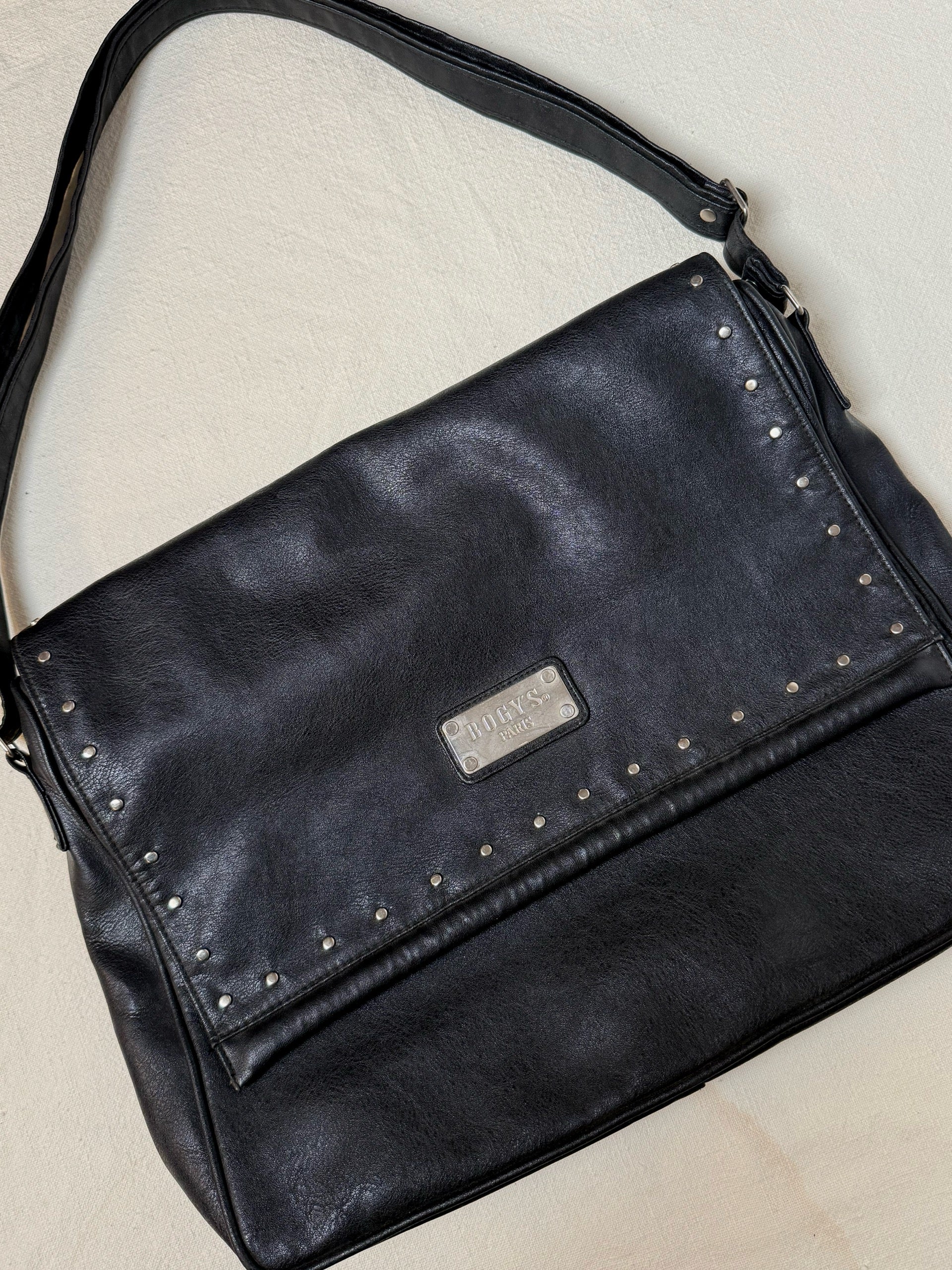 Large black leather bag with vintage studs