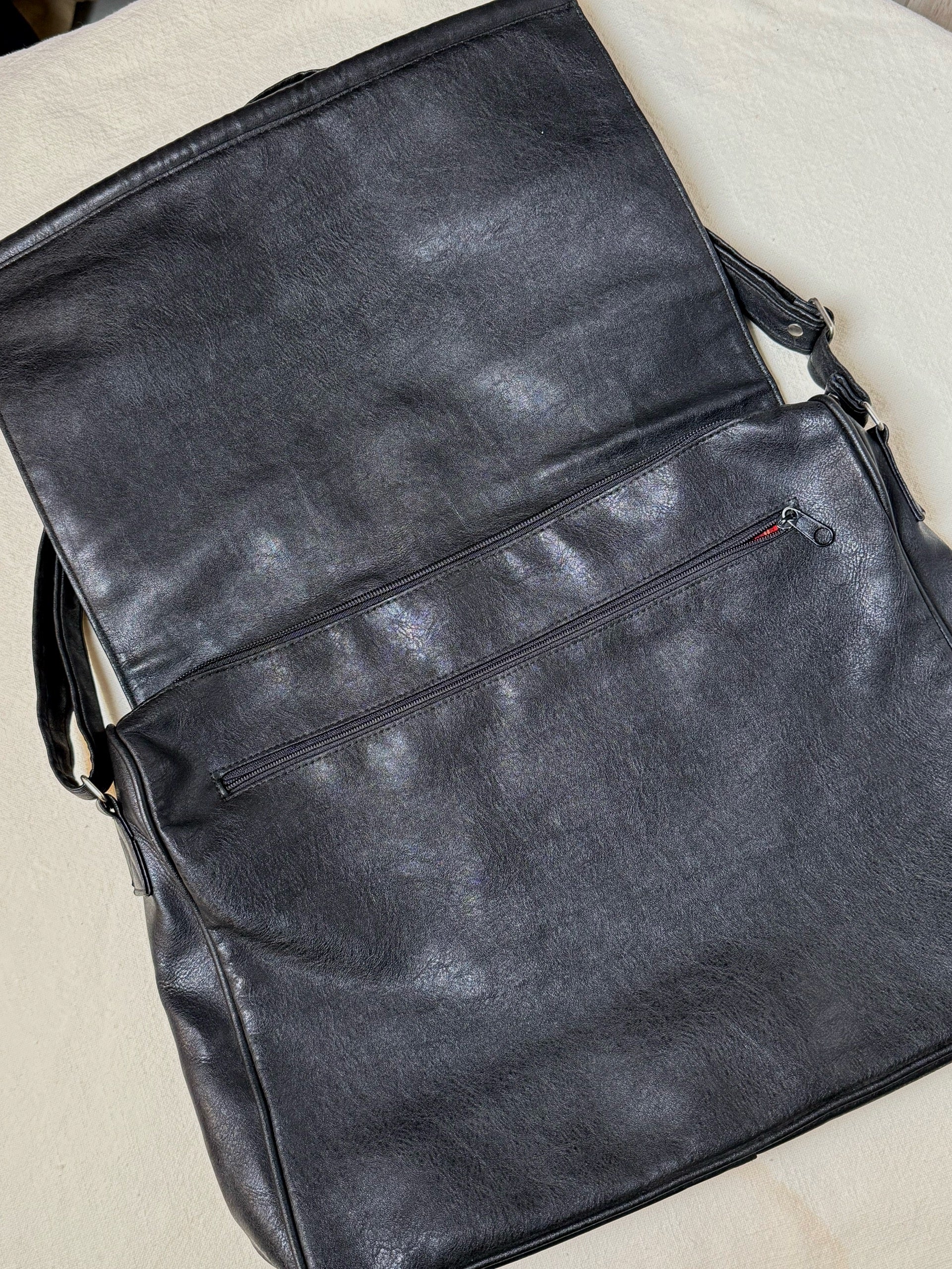 Large black leather bag with vintage studs