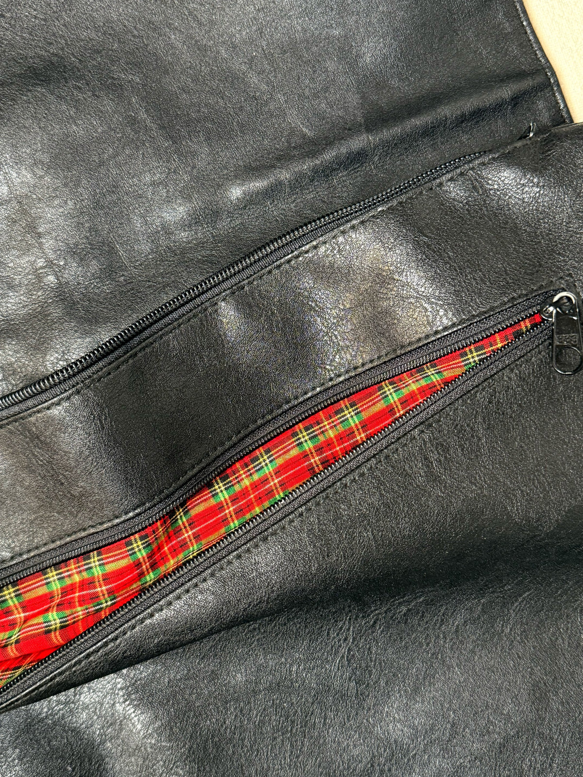 Large black leather bag with vintage studs