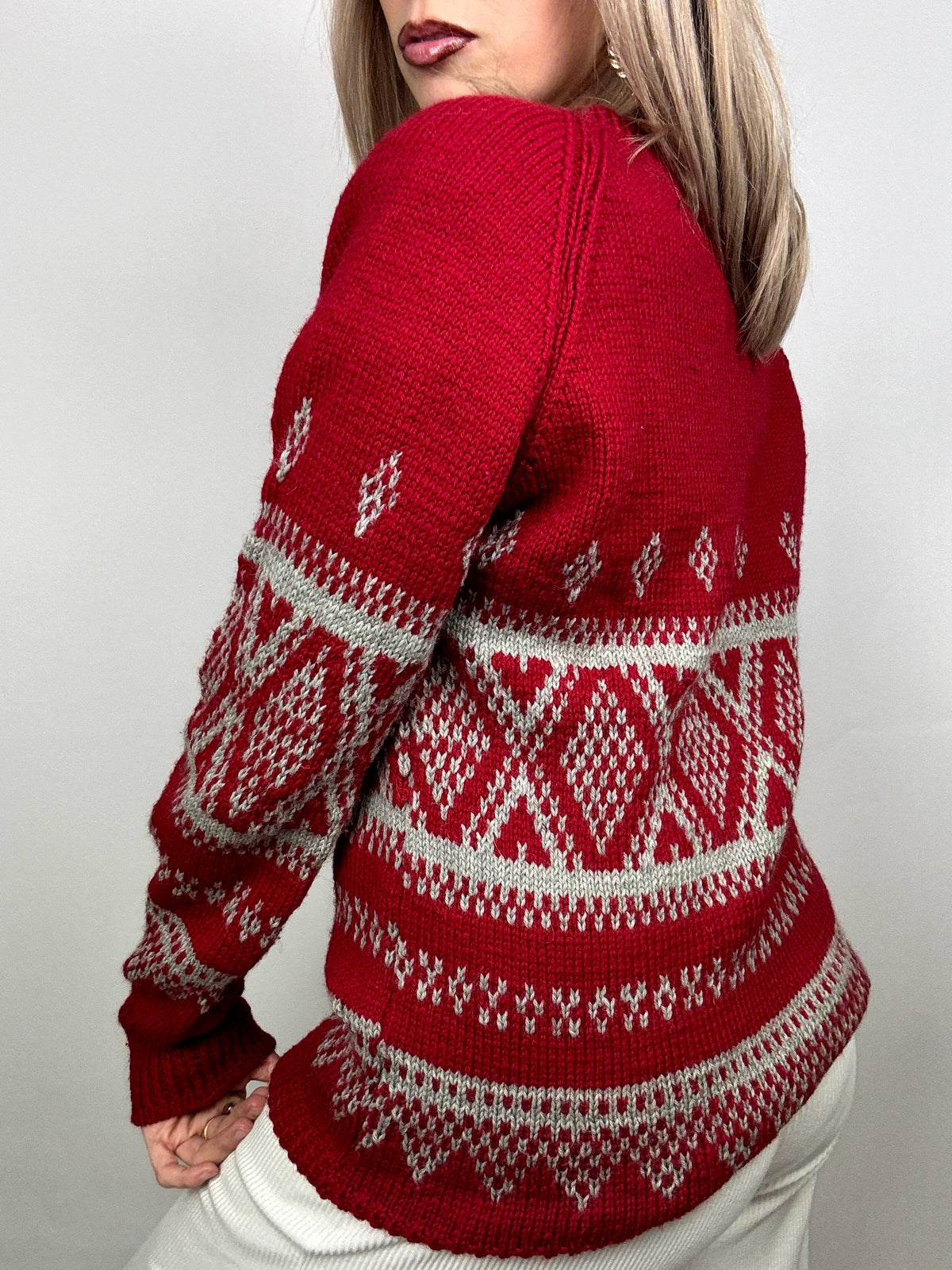 Red knitted Christmas sweater with vintage pattern L/XL