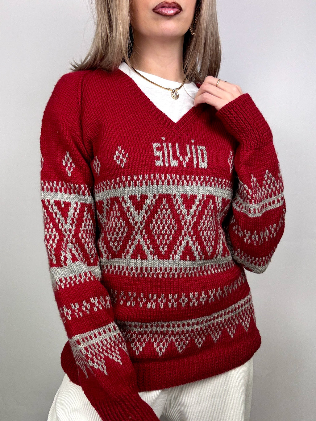 Red knitted Christmas sweater with vintage pattern L/XL