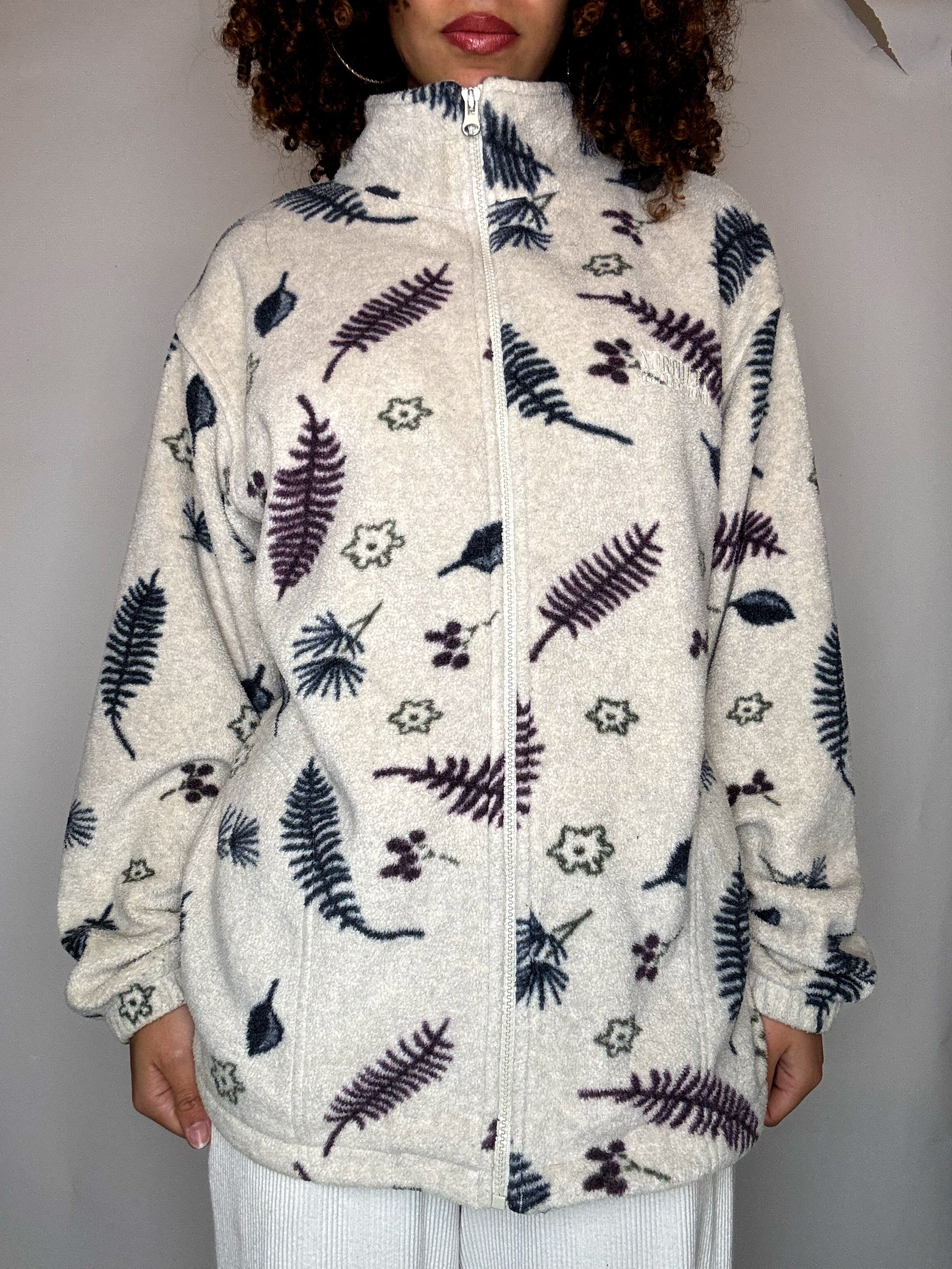 Beigefarbenes Fleece mit Vintage-Print, Größe M