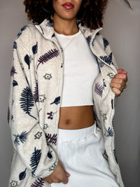 Beigefarbenes Fleece mit Vintage-Print, Größe M