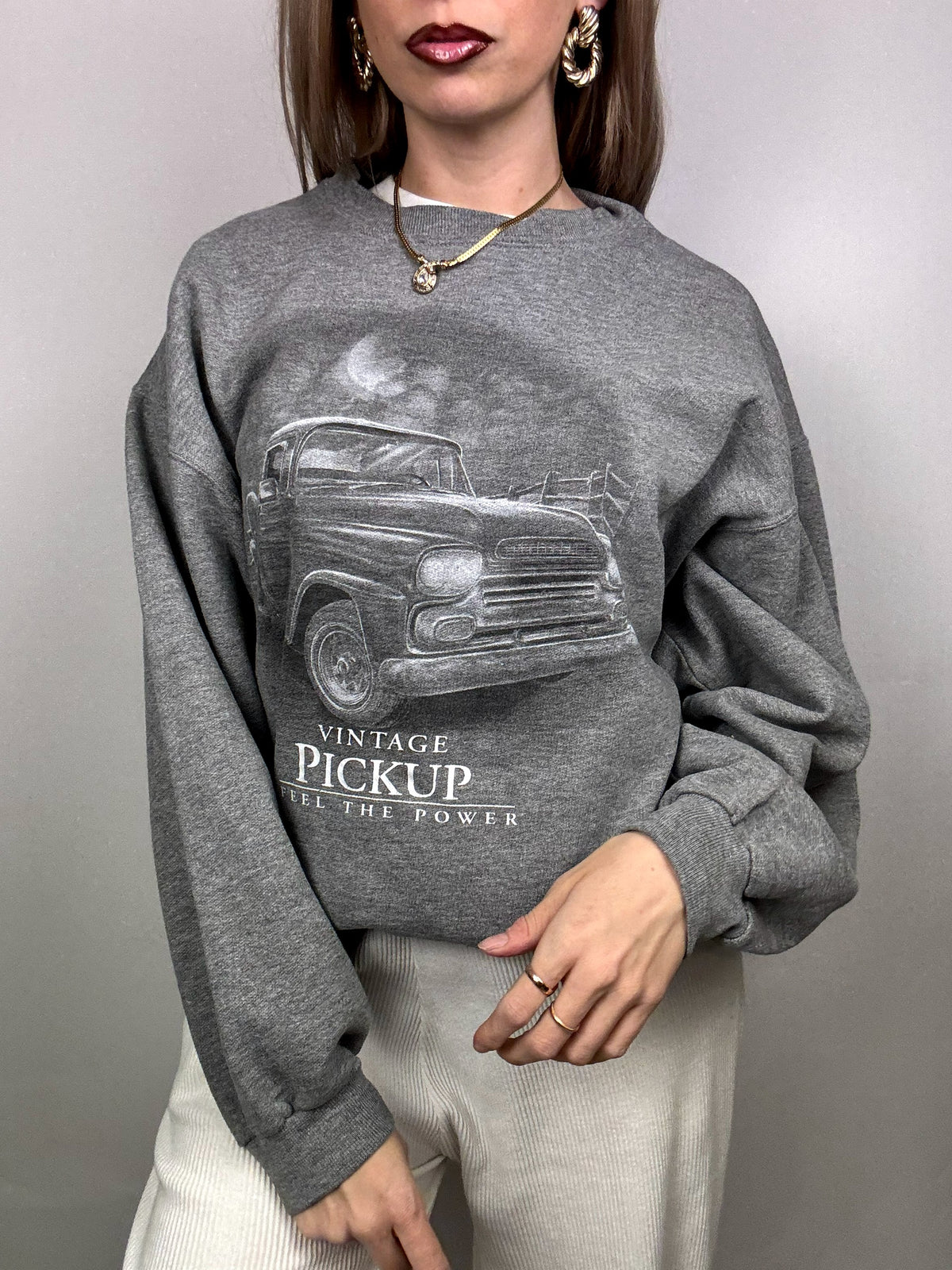 Graues Sweatshirt mit Rundhalsausschnitt und Vintage-Grafiken in M/L