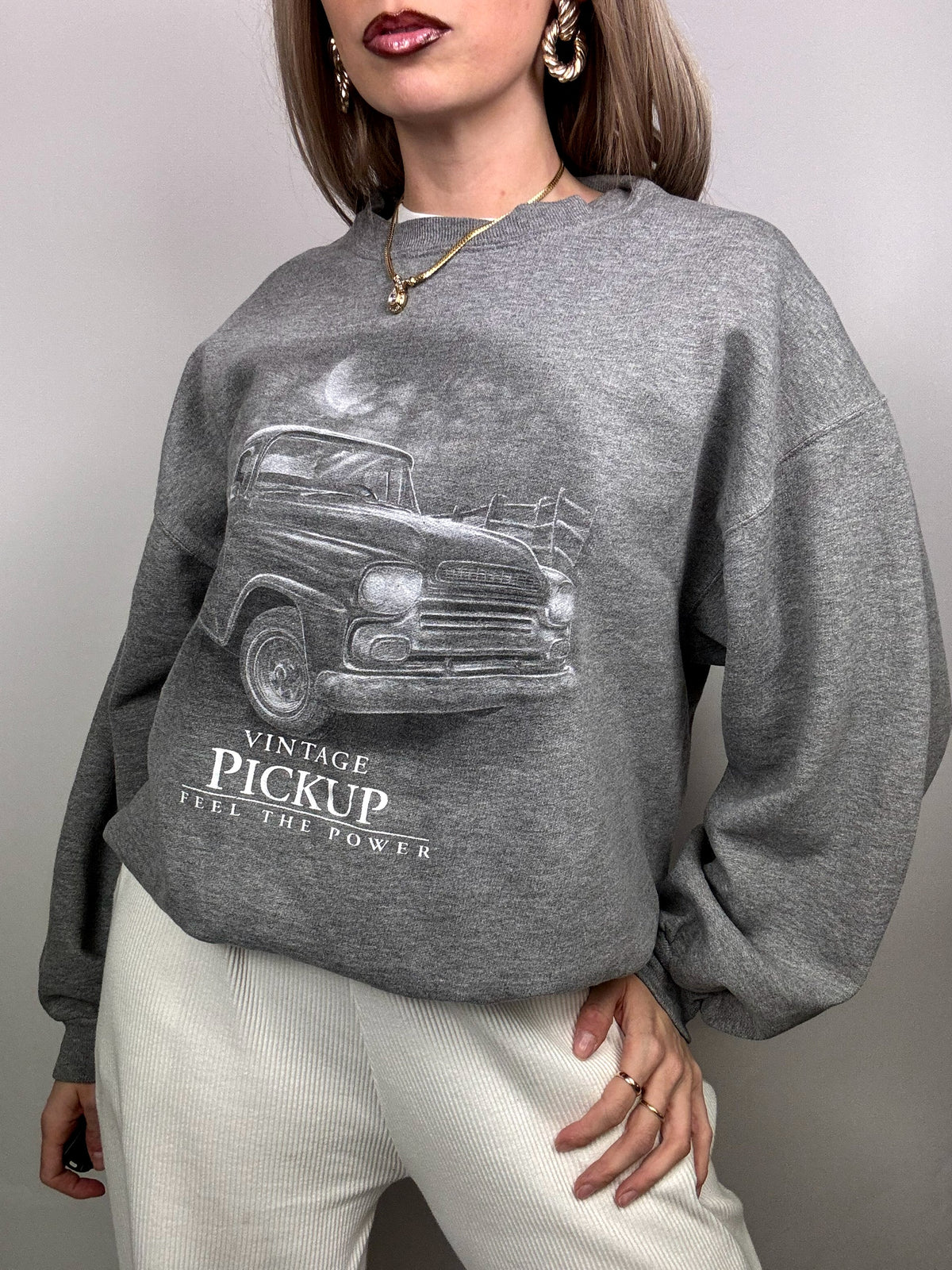 Graues Sweatshirt mit Rundhalsausschnitt und Vintage-Grafiken in M/L