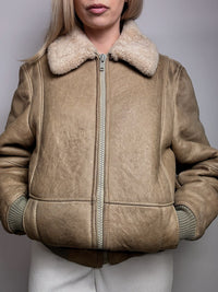 Beigefarbene Vintage-Lammfelljacke L/XL