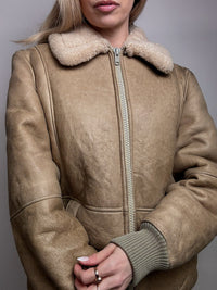 Beigefarbene Vintage-Lammfelljacke L/XL