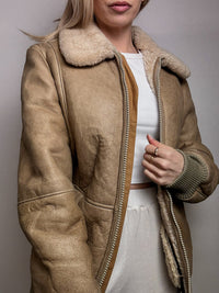 Beigefarbene Vintage-Lammfelljacke L/XL