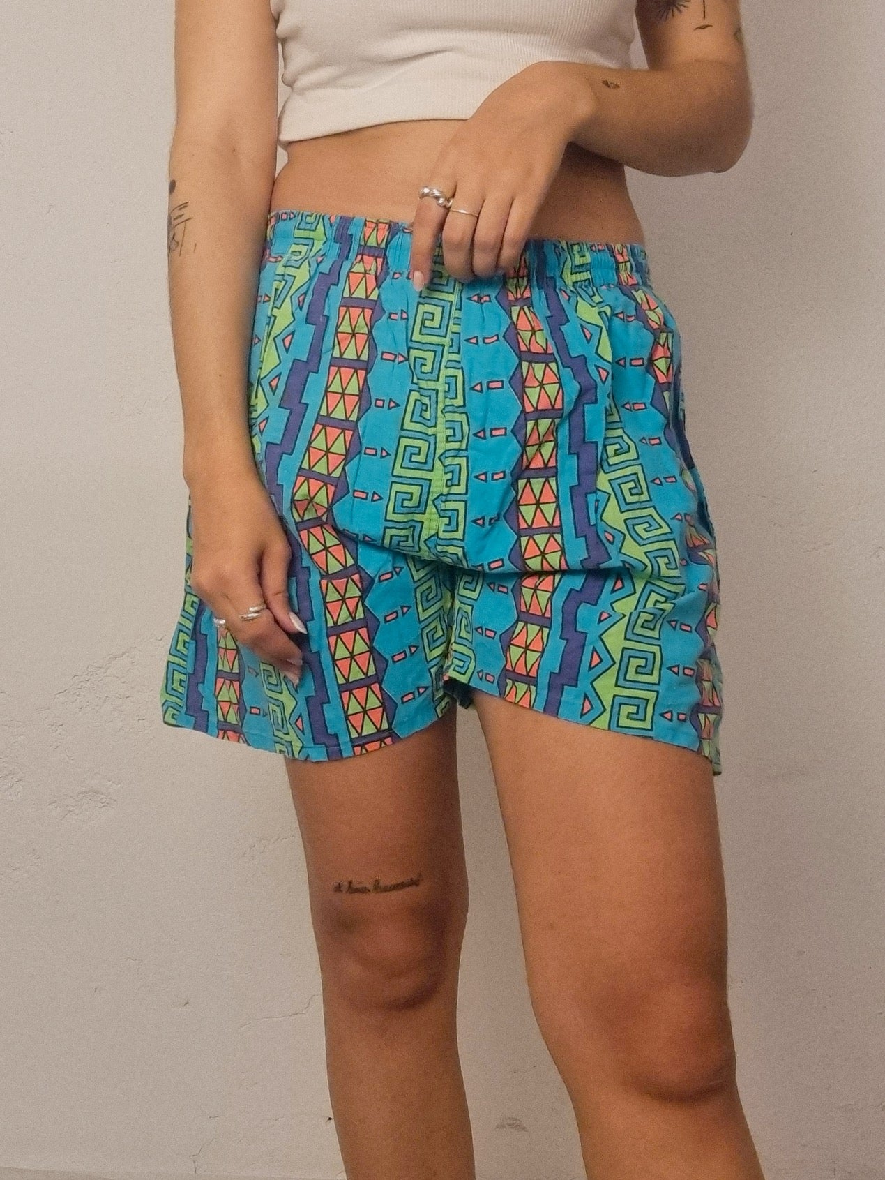 Short vintage turquoise  à motifs L