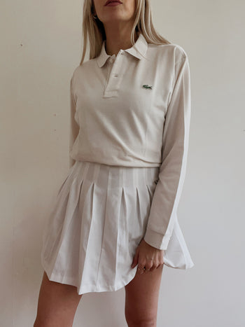 Polo Lacoste blanc XS / S