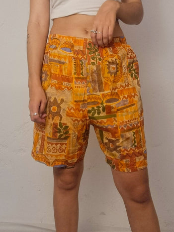 Short vintage orange  à motifs L