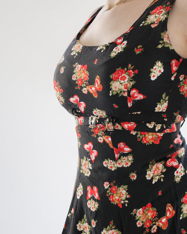 Vintage black strappy dress with floral patterns S