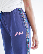 Marineblaue Jogginghose von Asics mit rosa Streifen S