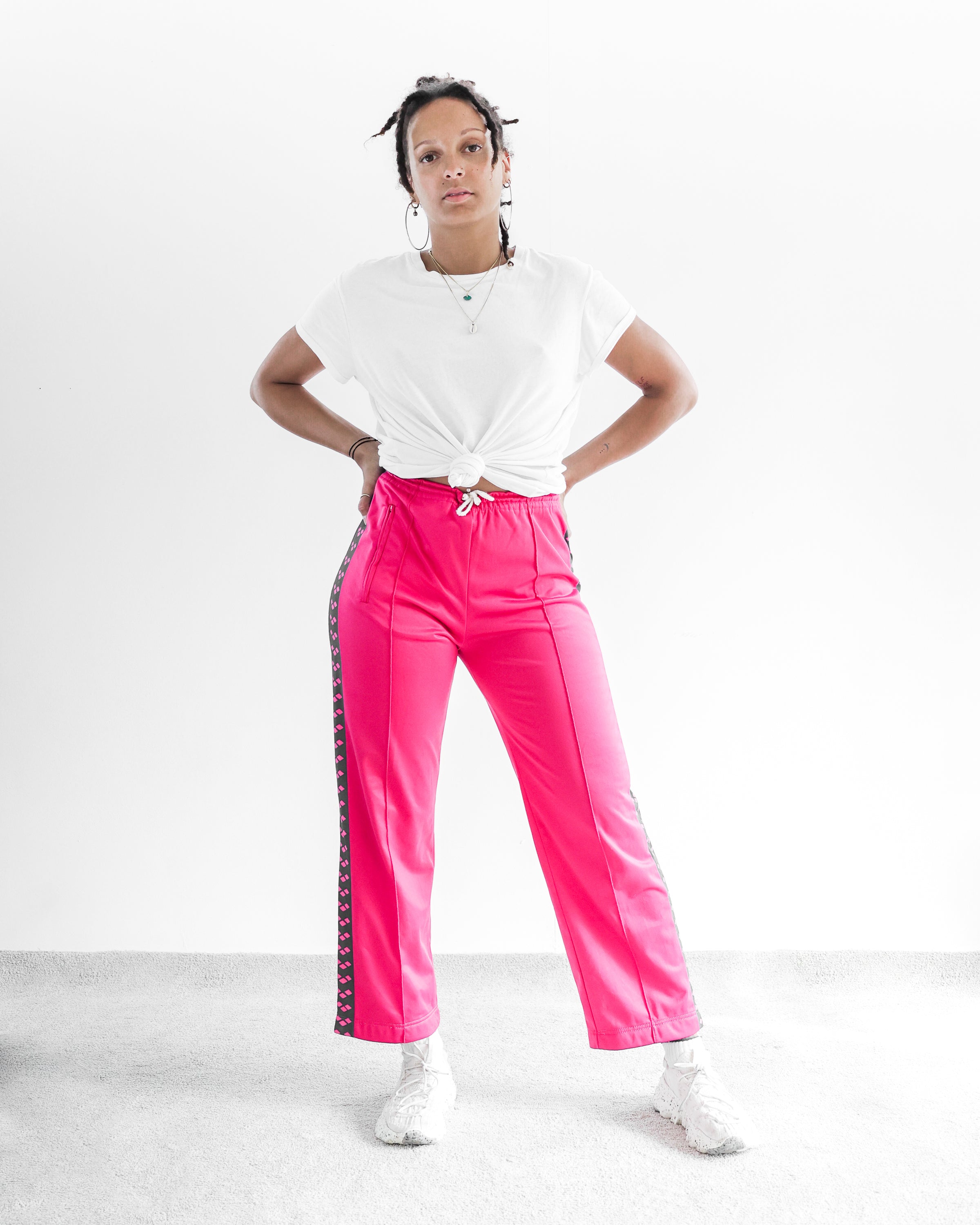 Pantalon de jogging Arena rose avec bandes foncées S/M