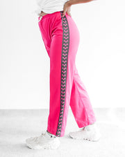 Pantalon de jogging Arena rose avec bandes foncées S/M