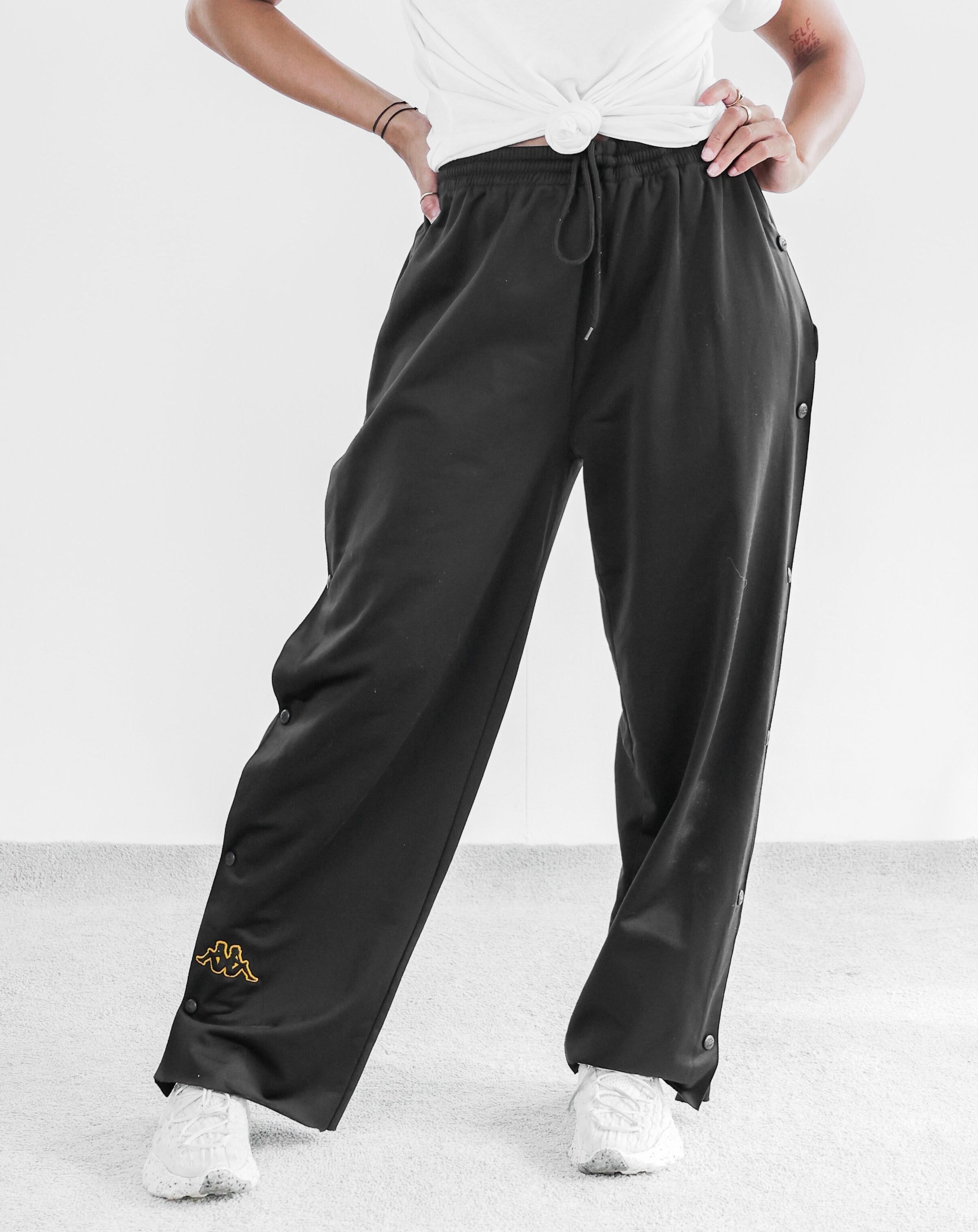 Kappa schwarze Jogginghose mit seitlichen Druckknöpfen XL